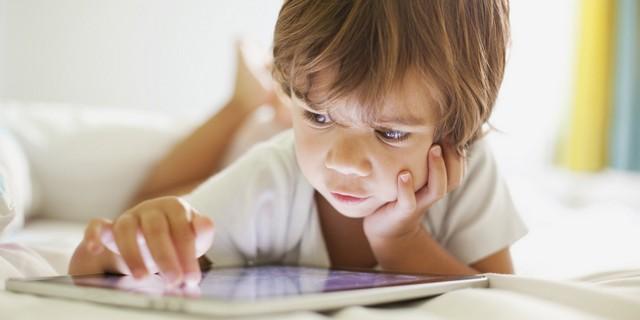 Small boy using a tablet